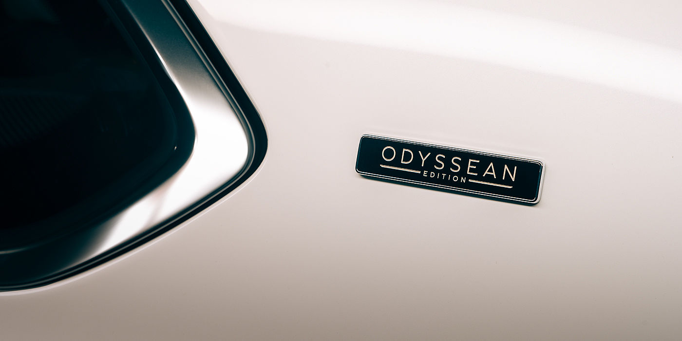 Bentley Bangkok Bentley Bentayga Odyssean Edition SUV Odyssean badge close up with Snow Quartz Pearlescent by Mulliner paint