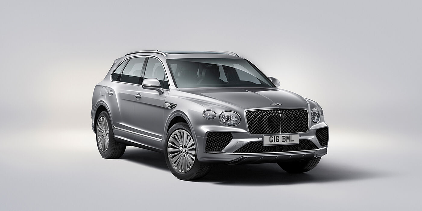 Bentley Bangkok Bentley Bentayga luxury SUV front three quarter view in Moonbeam paint with matrix grille and 21″ 5 spoke painted wheels