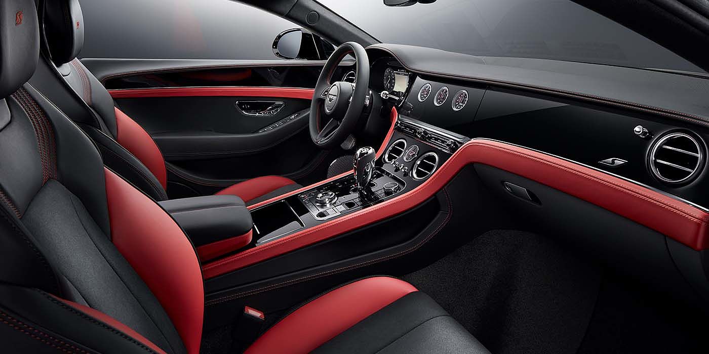 Bentley Bangkok Bentley Continental GT S coupe front interior in Beluga black and Hotspur red hide with high gloss Carbon Fibre veneer