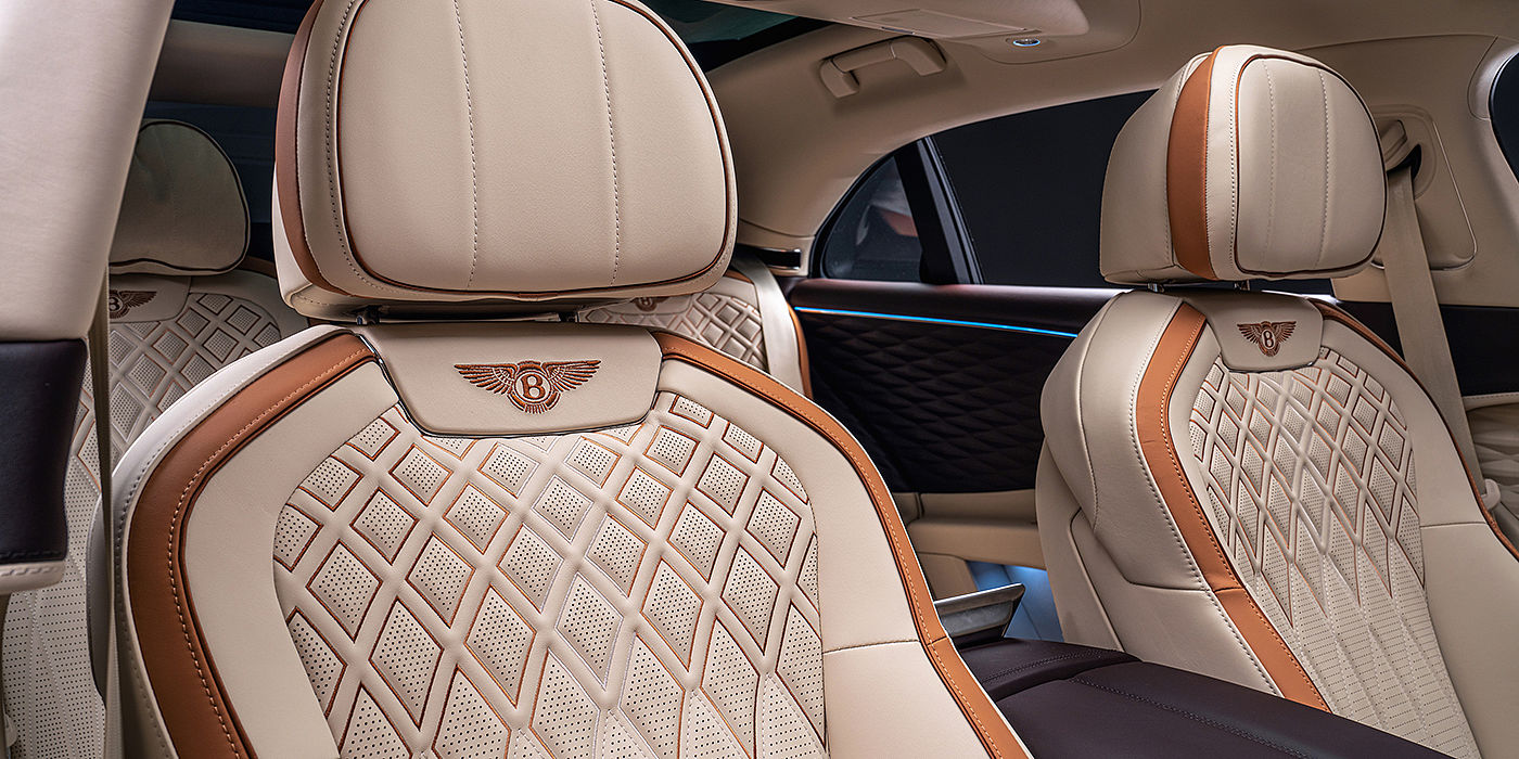 Bentley Bangkok Bentley Flying Spur Odyssean sedan rear seat detail with Diamond quilting and Linen and Burnt Oak hides