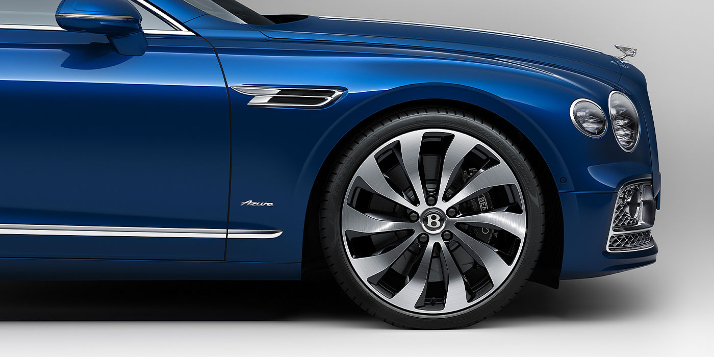 Bentley Bangkok Bentley Flying Spur Azure sedan side close up in Sequin Blue paint with Azure badge
