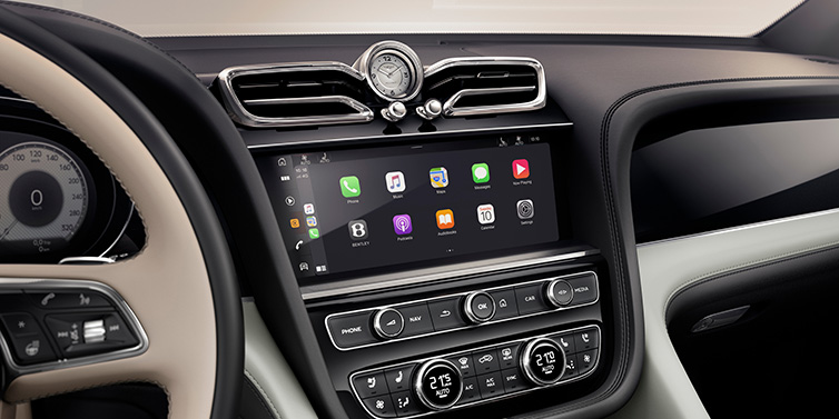 Bentley Bangkok Bentley Bentayga Extended Wheelbase Mulliner SUV front interior centre console with MMI screen showing Apps surrounded by Linen and Beluga black hide