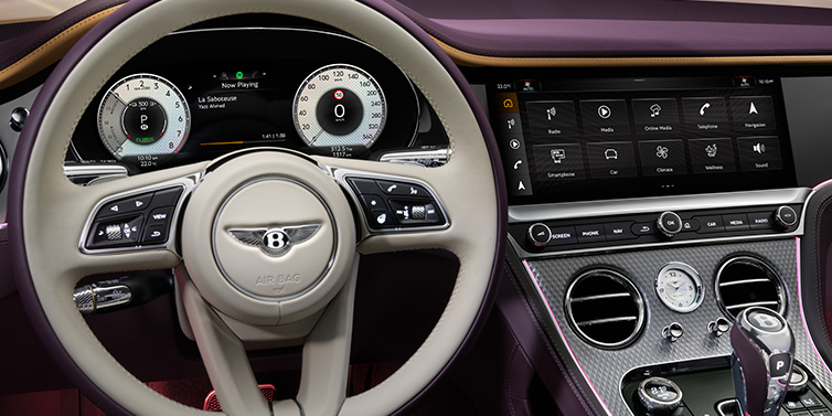Bentley Bangkok Bentley Continental GTC Mulliner convertible steering wheel and drivers screens surrounded by Damson purple and Linen hides